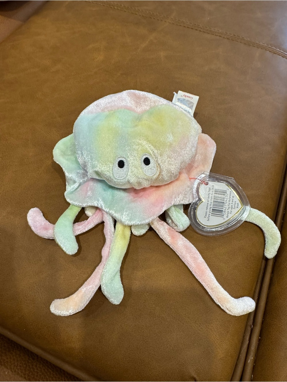 This is a 1999 Ty Beanie Baby plush toy named Goochy the Octopus.